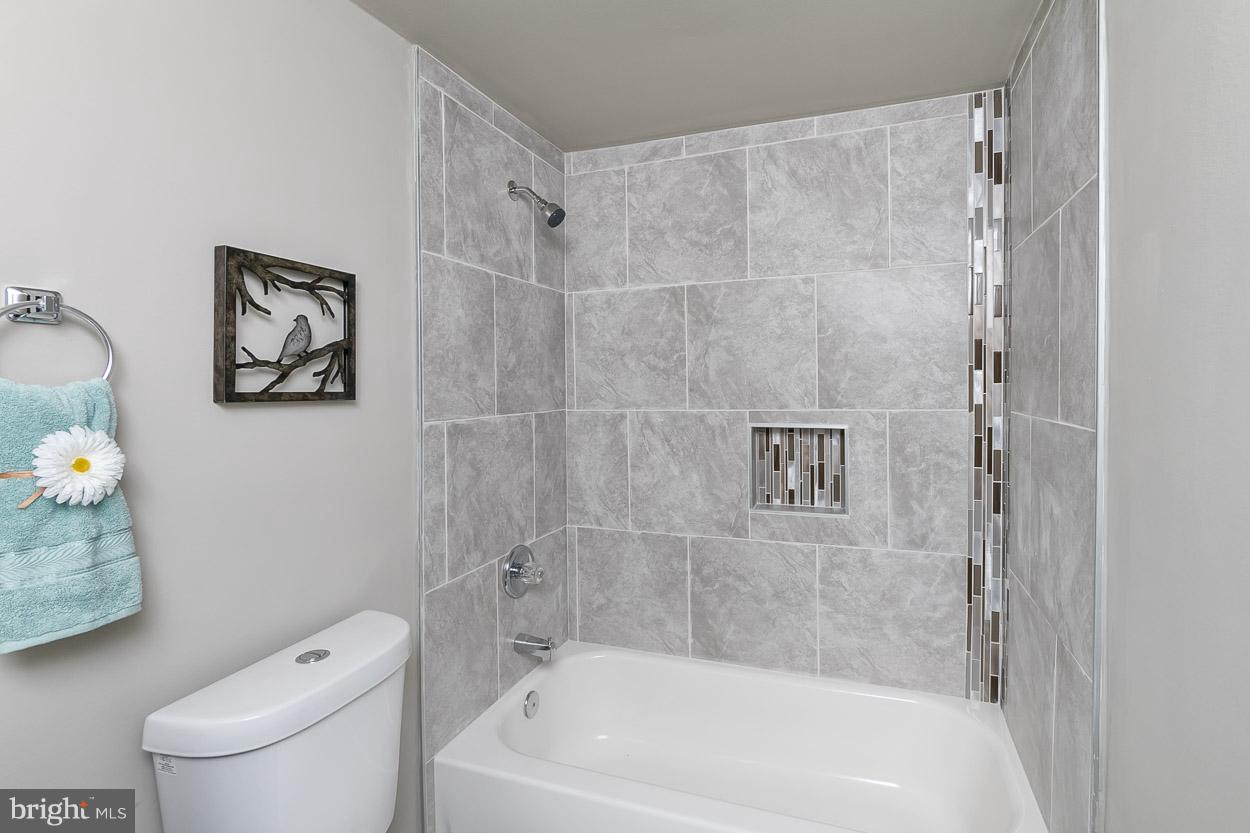 2801 Page Court Fallston, MD 21047 - Photo 30 of 30 a bath room with a toilet and a bath tub