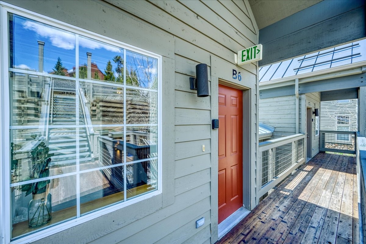 91399 Ryan Gulch Road, Unit B6 Silverthorne, CO 80498 - Photo 36 of 36 a view of front door and wooden floor