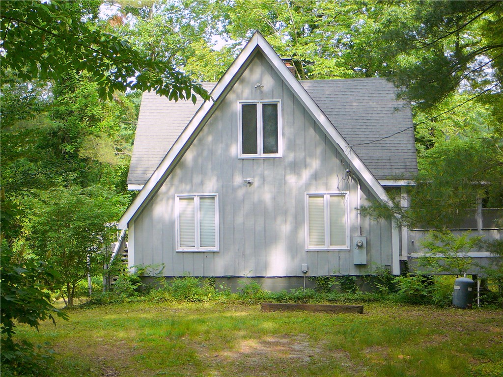 117 C-14-70 Anderson, SC 29621 - Photo 4 of 7 A-frame design nestled amidst abundant greenery offers a secluded, private escape.