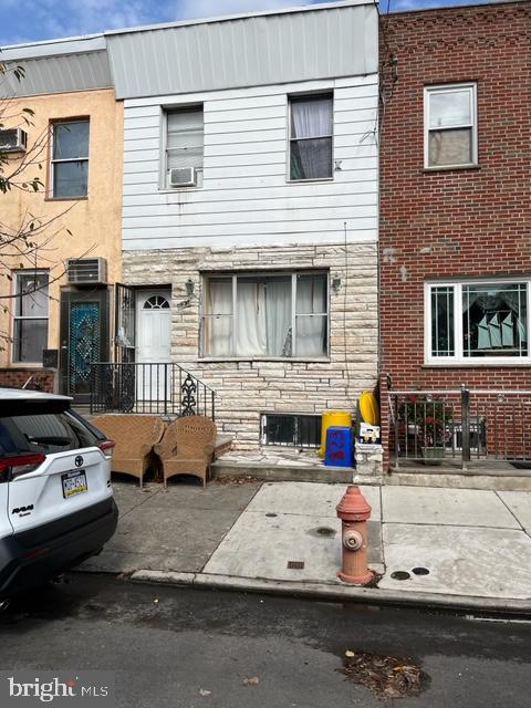 a car parked in front of a house