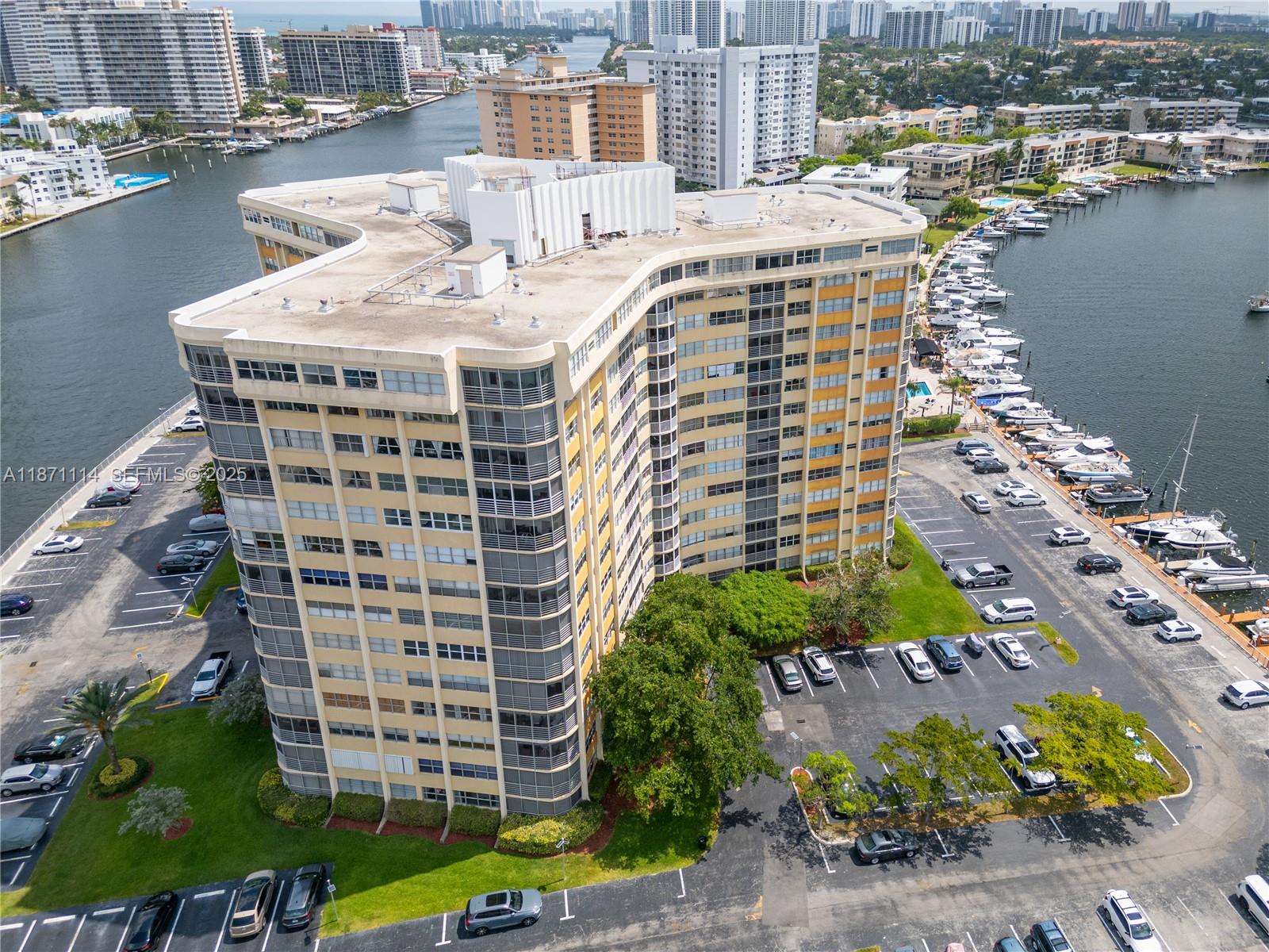 100 Golden Isles Drive, Unit 809 Hallandale Beach, FL 33009 - Photo 17 of 18 a view of a city with tall buildings