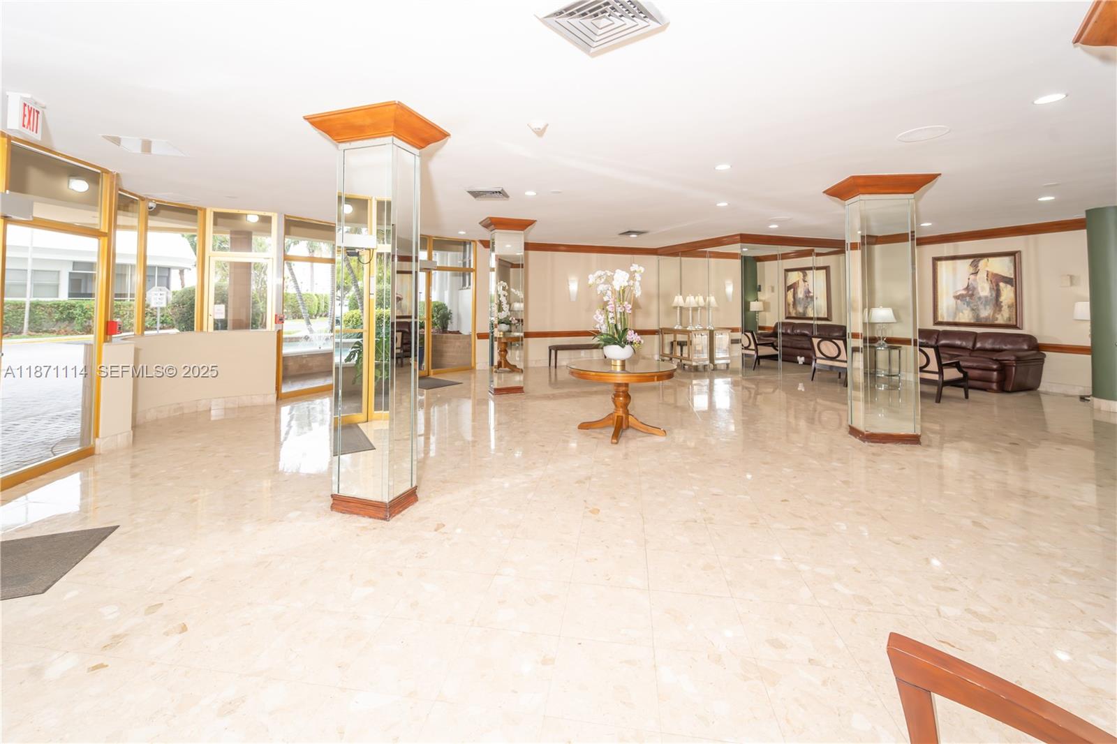 100 Golden Isles Drive, Unit 809 Hallandale Beach, FL 33009 - Photo 3 of 18 an outdoor space with patio lots of furniture