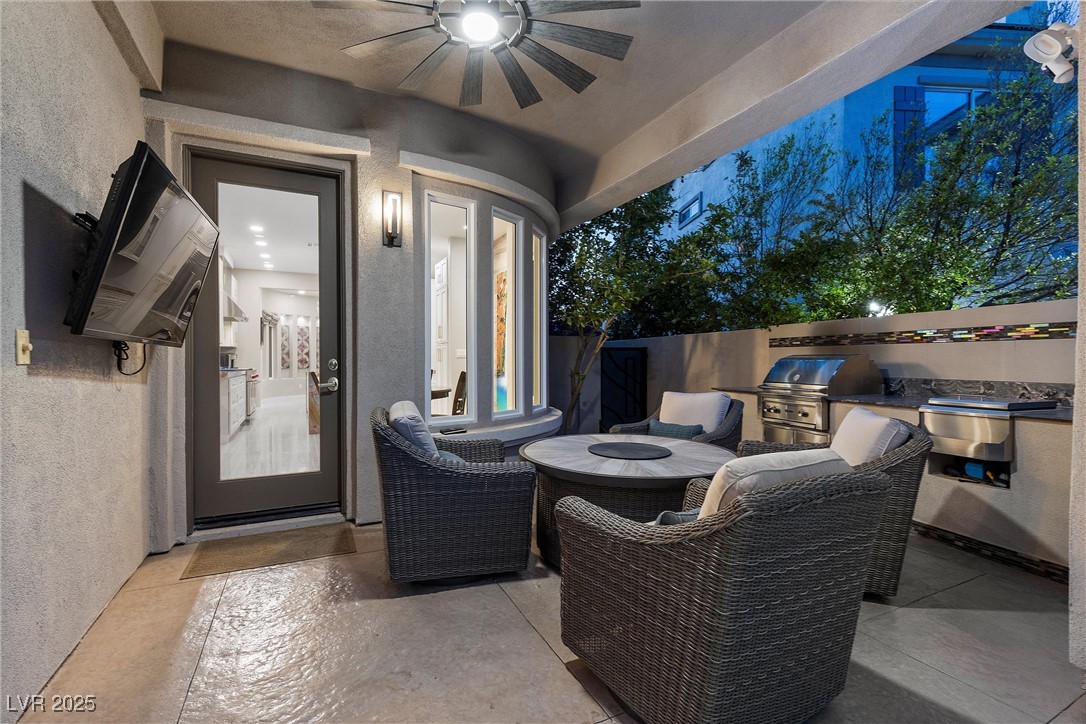 1911 Alcova Ridge Drive Las Vegas, NV 89135 - Photo 38 of 43 View of patio featuring area for grilling and a ceiling fan