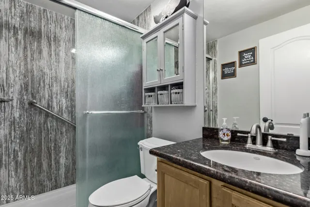 a view of a chairs and table in patio