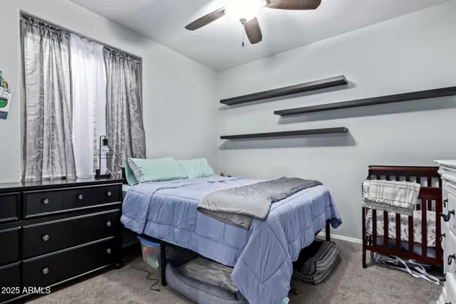a view of a chairs and table in the patio