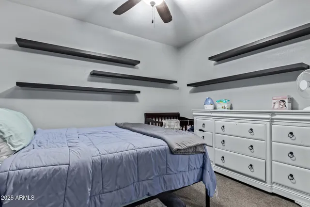 a view of a chairs and table in the patio