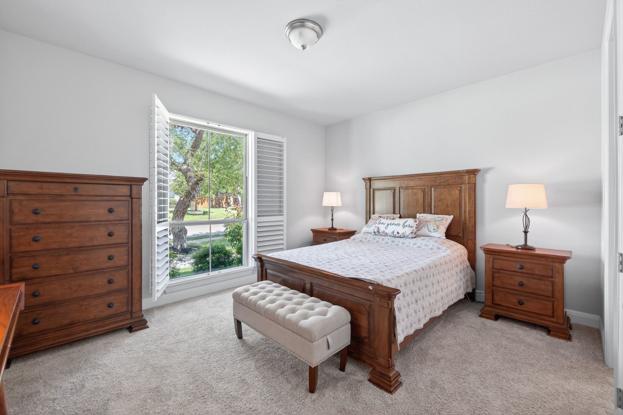 4105 Haight Street Round Rock, TX 78681 - Photo 25 of 40 a bedroom with a bed and a dresser
