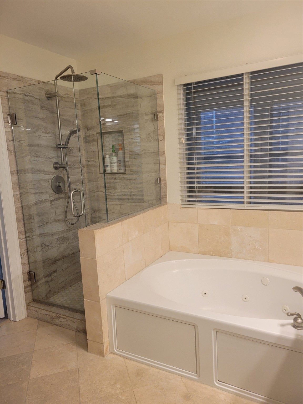 3203 Tom Green Street, Unit 3A Austin, TX 78705 - Photo 21 of 33 a bathroom with a bathtub and shower