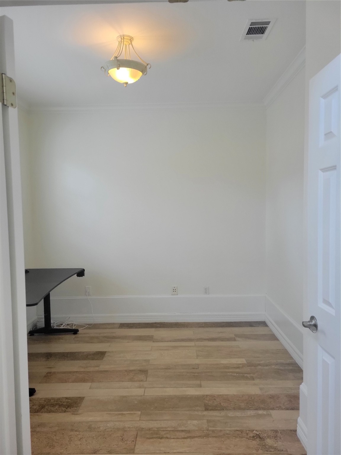 3203 Tom Green Street, Unit 3A Austin, TX 78705 - Photo 30 of 33 a room with a bench