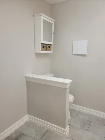 a bathroom with a sink and a toilet