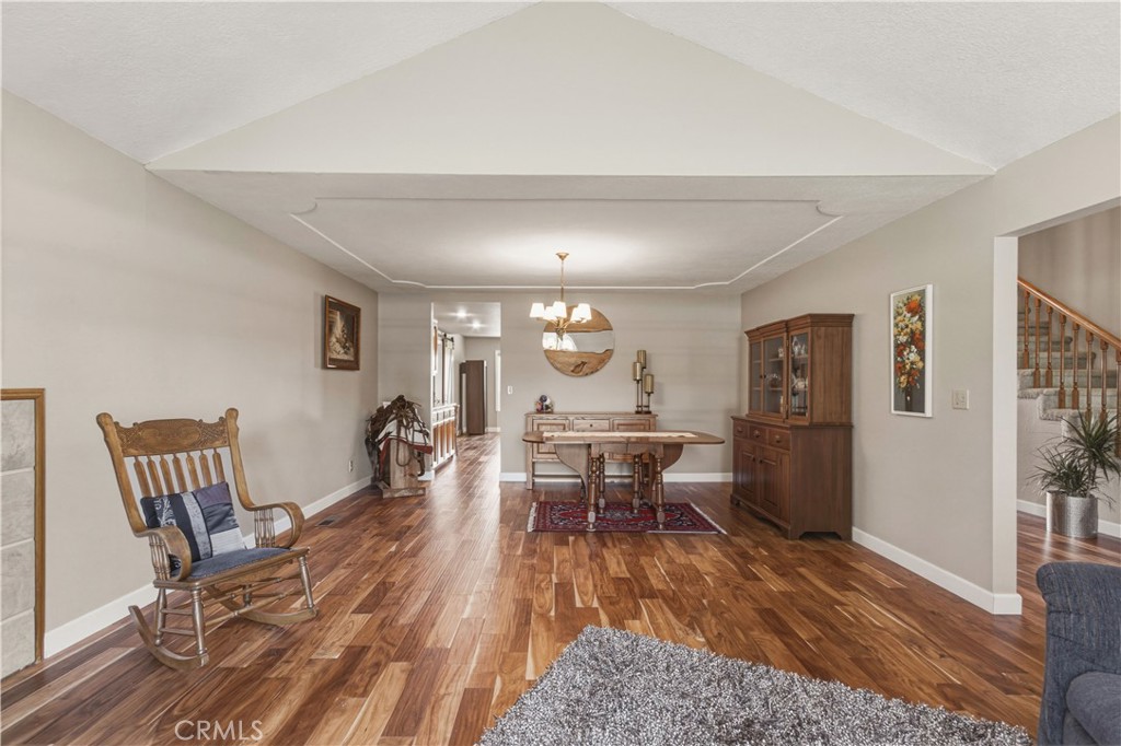 3856 North Gardner Avenue Merced, CA 95340 - Photo 7 of 59 a living room with furniture and a wooden floor
