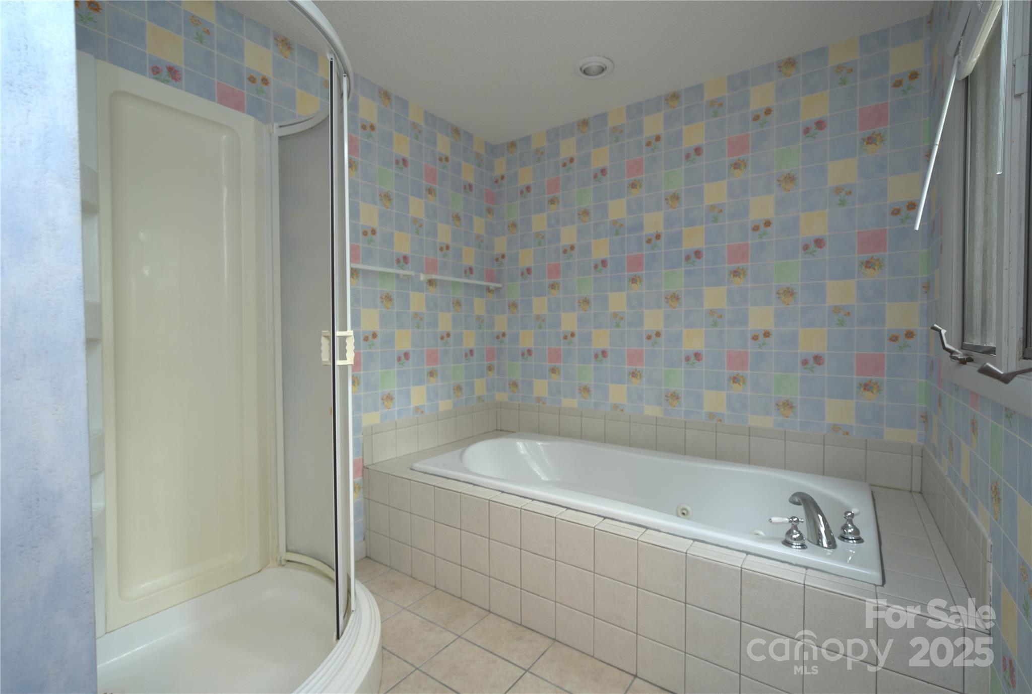 218 McGuffey Ridge Road Gerton, NC 28735 - Photo 19 of 29 a white bath tub sitting next to a shower