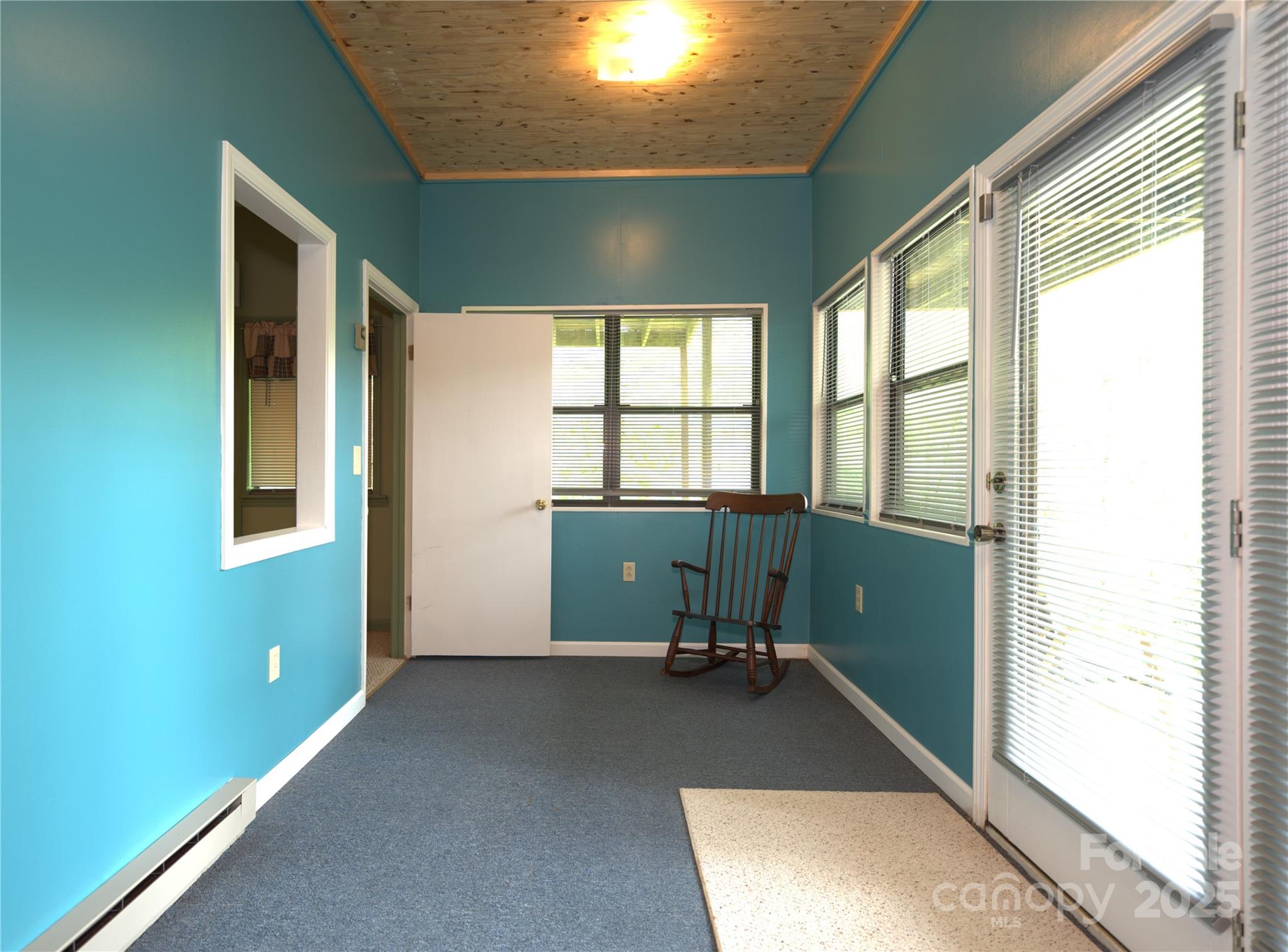 218 McGuffey Ridge Road Gerton, NC 28735 - Photo 25 of 29 a view of an empty room and window