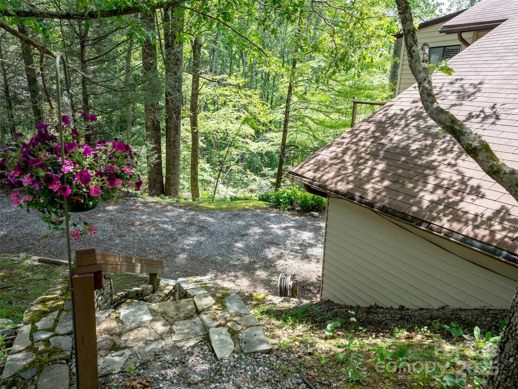 218 McGuffey Ridge Road Gerton, NC 28735 - Photo 10 of 29 a house with lots of trees