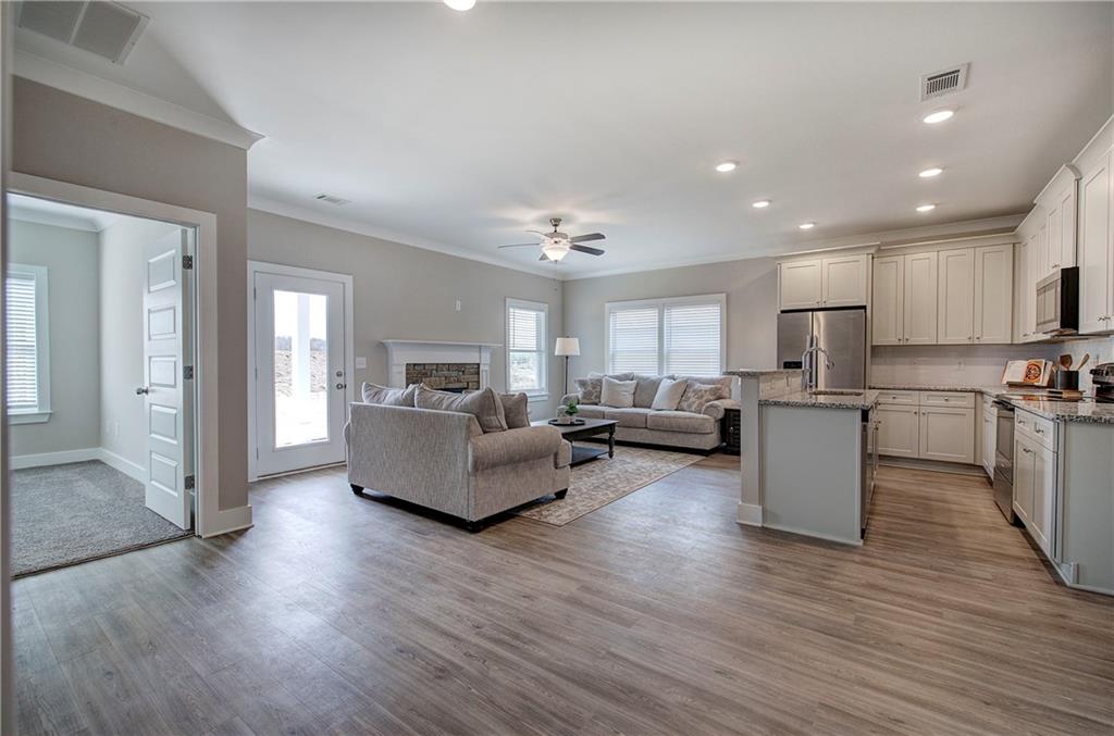 146 Sunflower Circle Cartersville, GA 30121 - Photo 28 of 44 a living room with furniture and kitchen view
