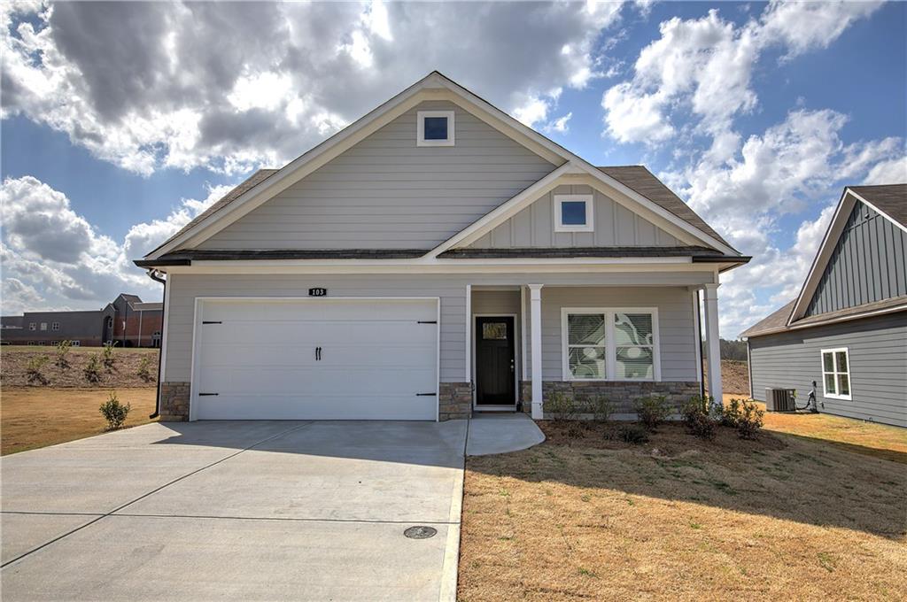 146 Sunflower Circle Cartersville, GA 30121 - Photo 5 of 44 a front view of a house with a yard