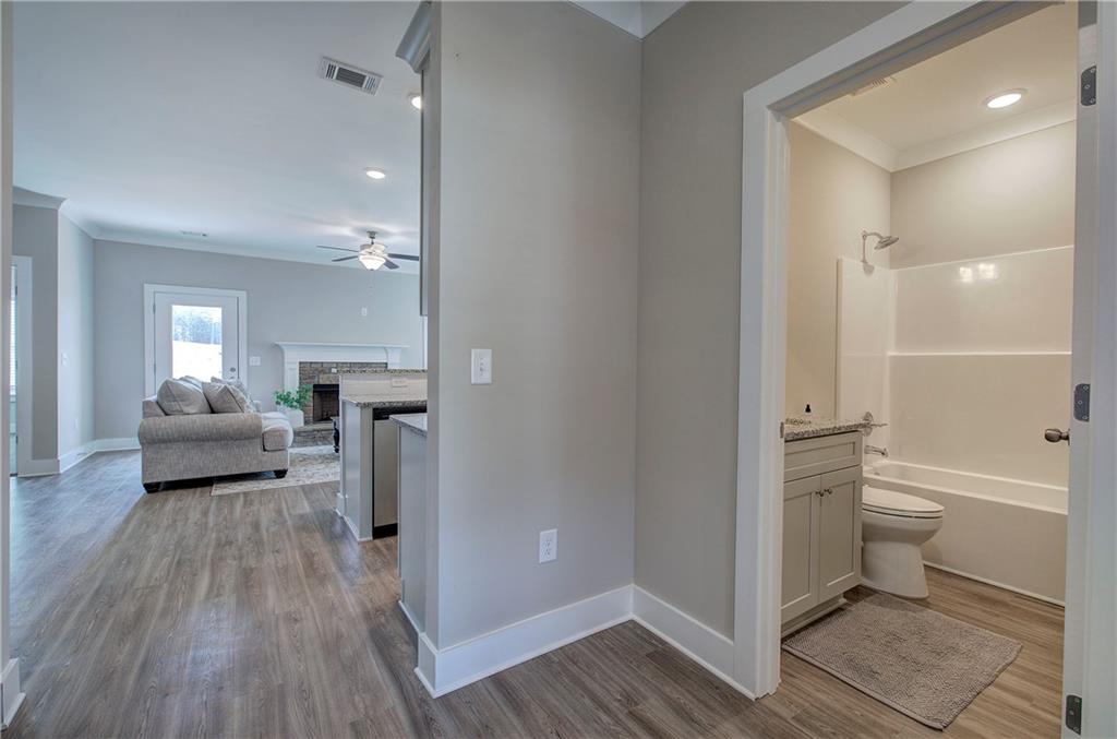 146 Sunflower Circle Cartersville, GA 30121 - Photo 6 of 44 a bathroom with a sink toilet and shower