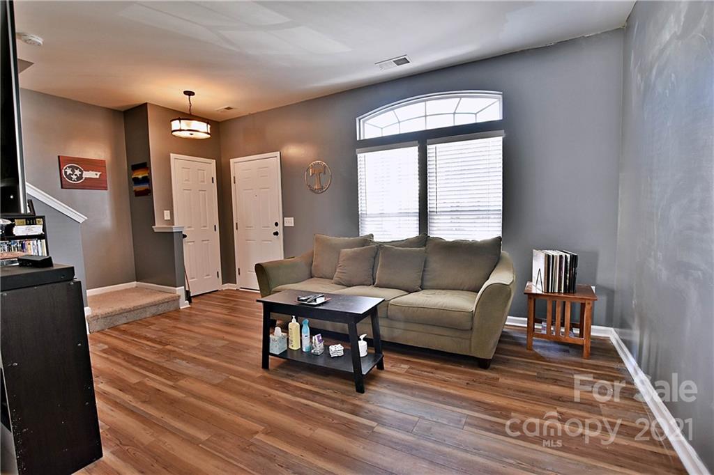 828 Dillard Road Rock Hill, SC 29730 - Photo 3 of 16 a living room with furniture and a wooden floor