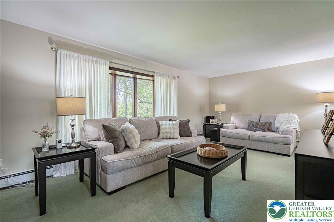 3857 Friedens Road Slatington, PA 18080 - Photo 32 of 75 This inviting living room offers comfort and a bright atmosphere for everyday living.