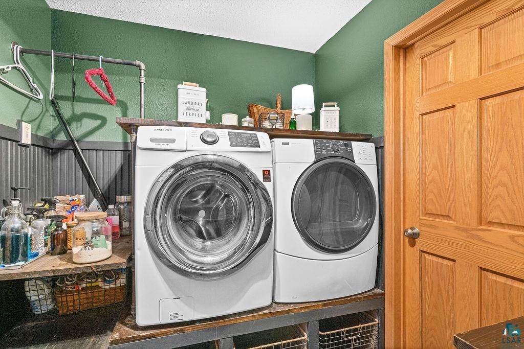 2783 Lauren Road Duluth, MN 55804 - Photo 17 of 47 Laundry room featuring washer and clothes dryer