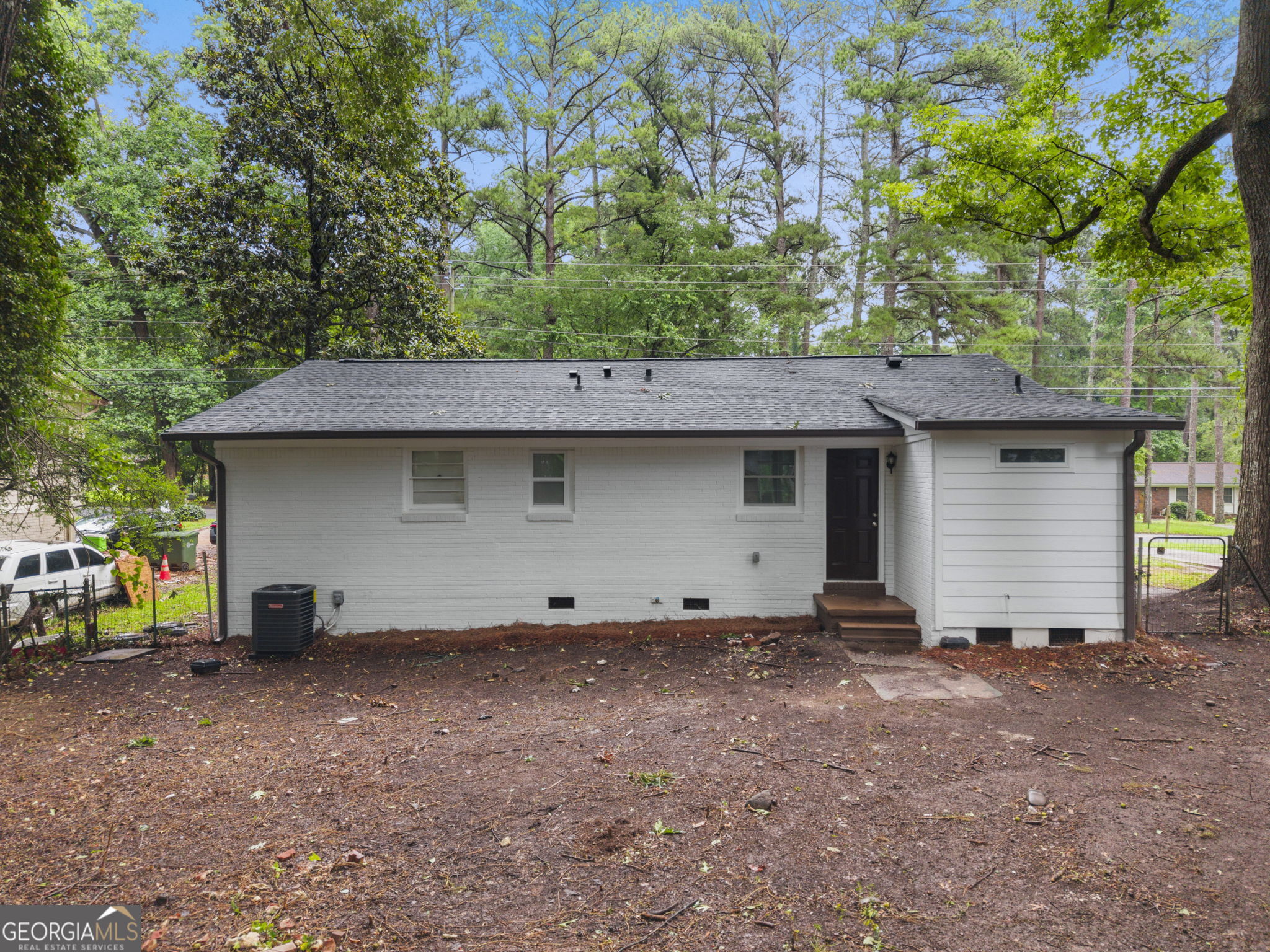 3567 Forrest Park Road Southeast Atlanta, GA 30354 - Photo 25 of 29 a backyard of a house with lots of green space
