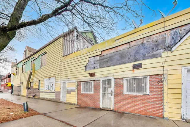 a view of a house with a street