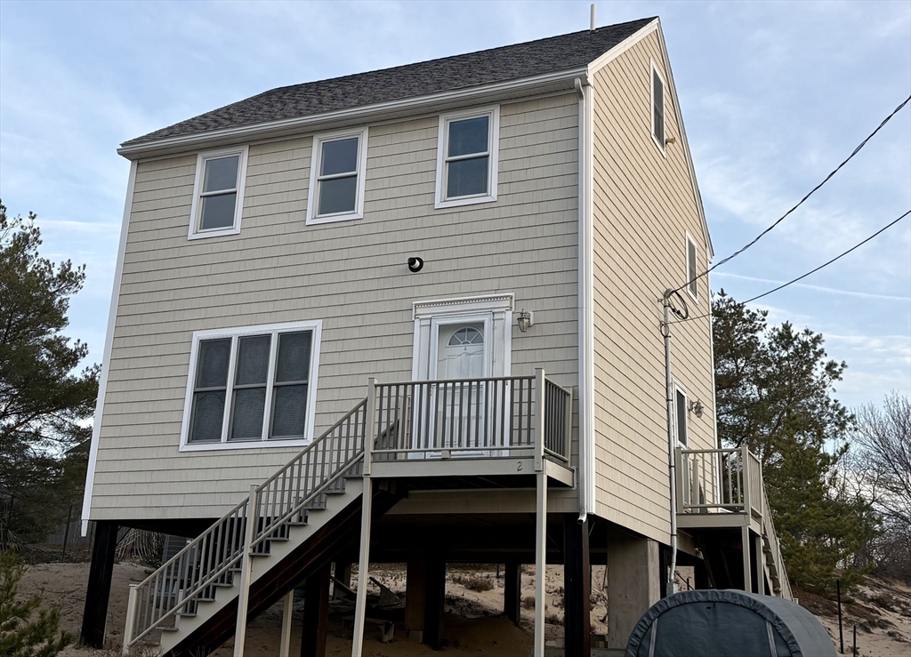 a front view of a house with balcony