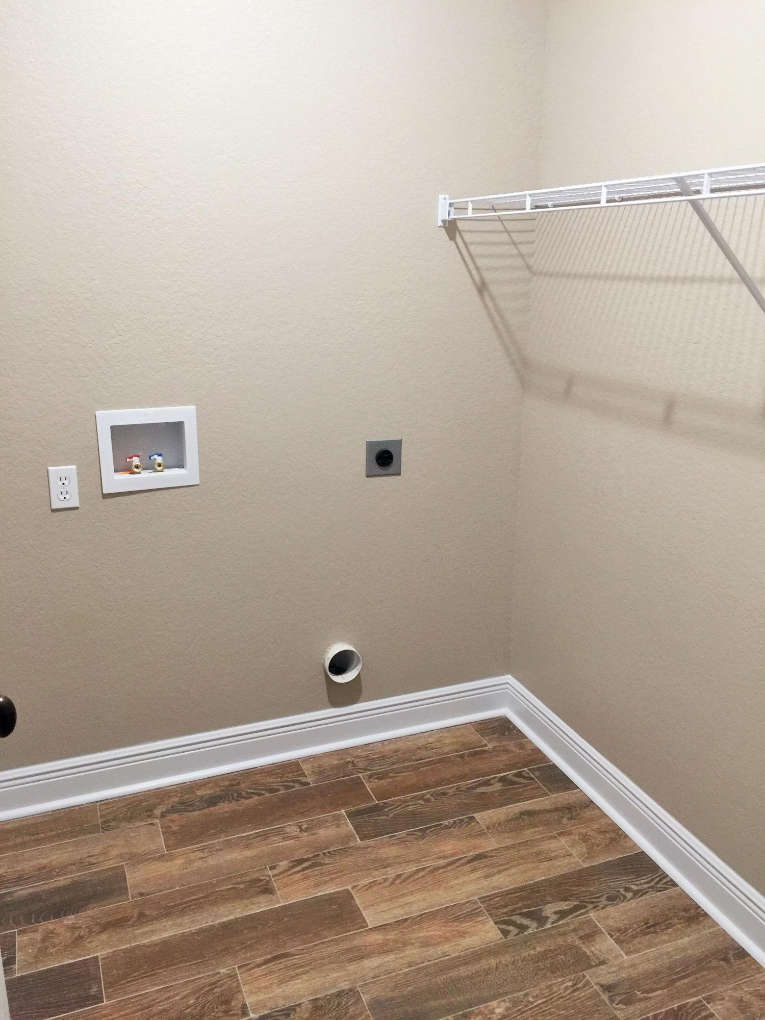 4011 Happy Trails Road Crestview, FL 32539 - Photo 19 of 19 a view of a room with empty racks on the wall
