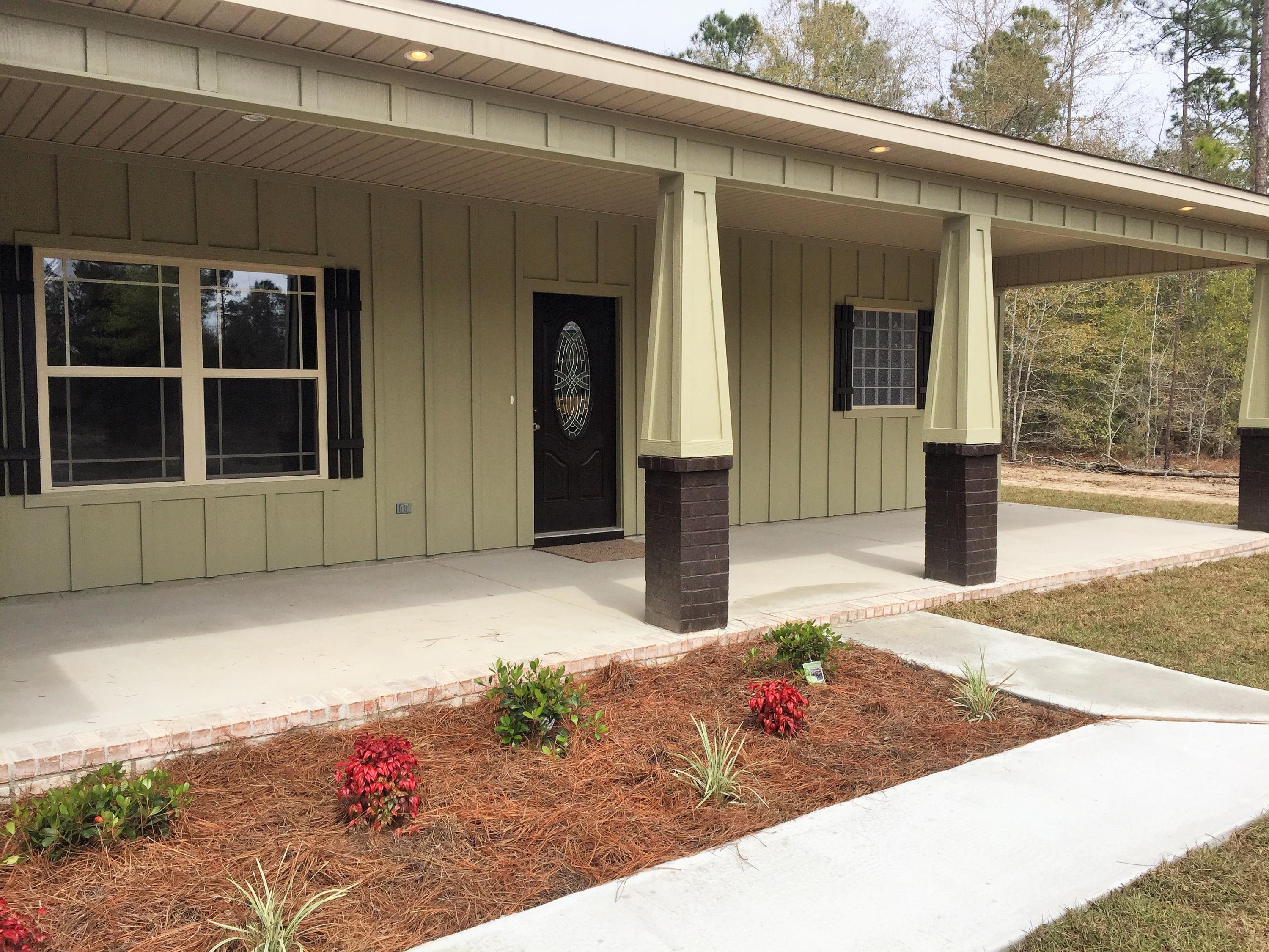 4011 Happy Trails Road Crestview, FL 32539 - Photo 4 of 19 a front view of a house
