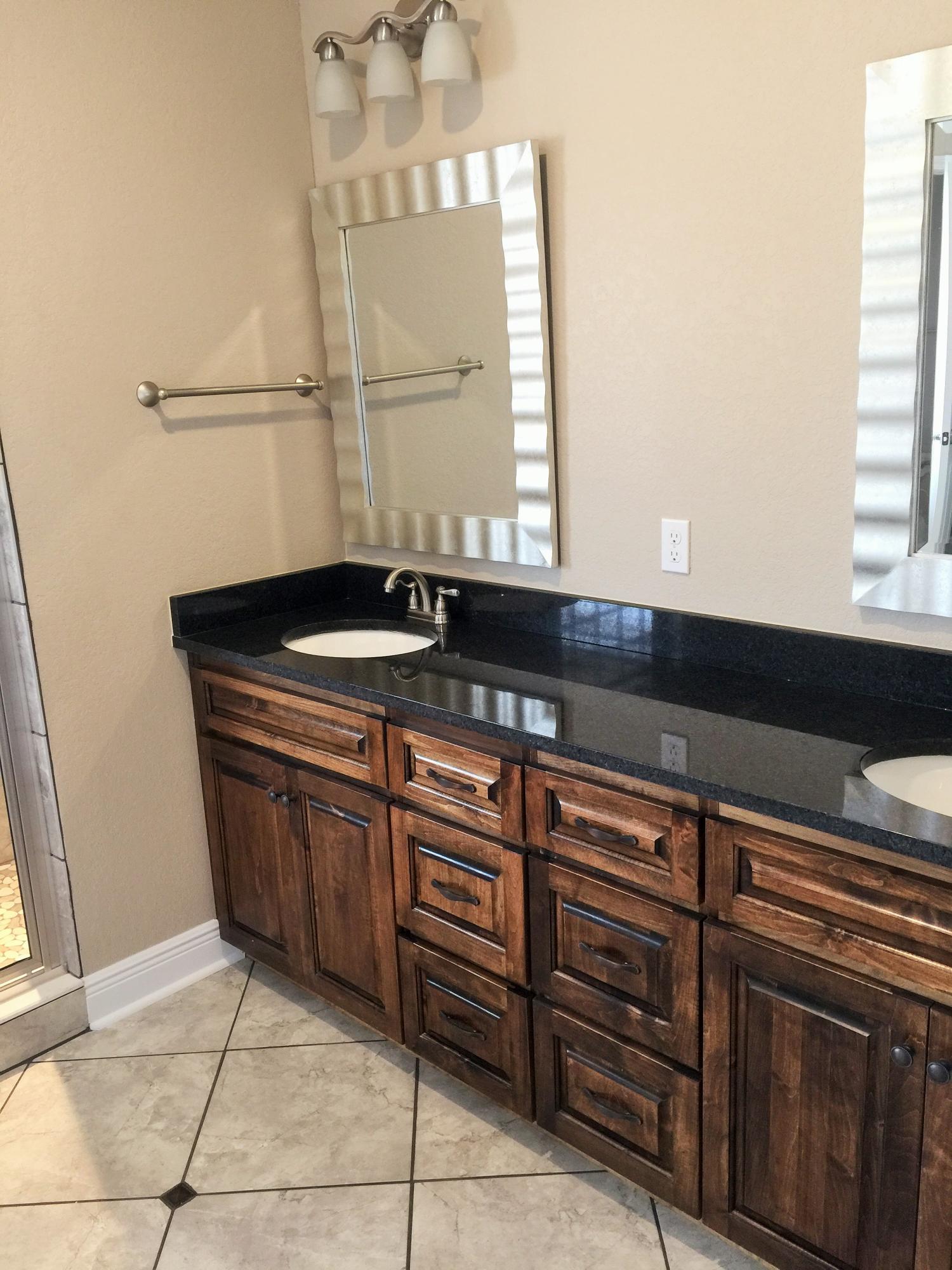 4011 Happy Trails Road Crestview, FL 32539 - Photo 7 of 19 a kitchen with granite countertop a sink and cabinets