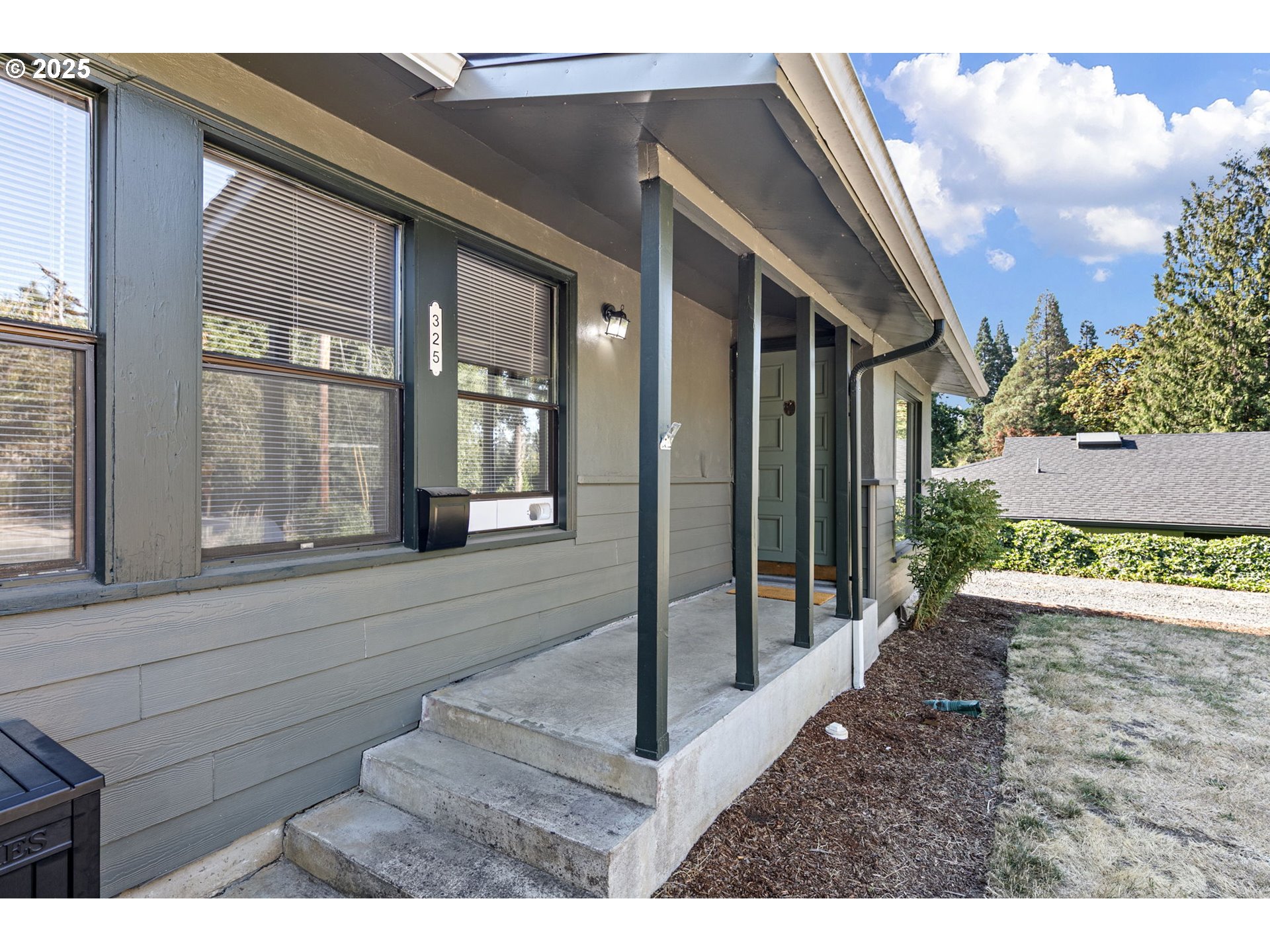 325 Water Street Springfield, OR 97477 - Photo 3 of 48 a view of a house with a porch
