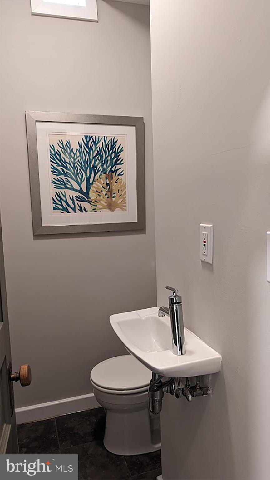 633 A Street Northeast Washington, DC 20002 - Photo 16 of 56 Powder room in the kitchen entry