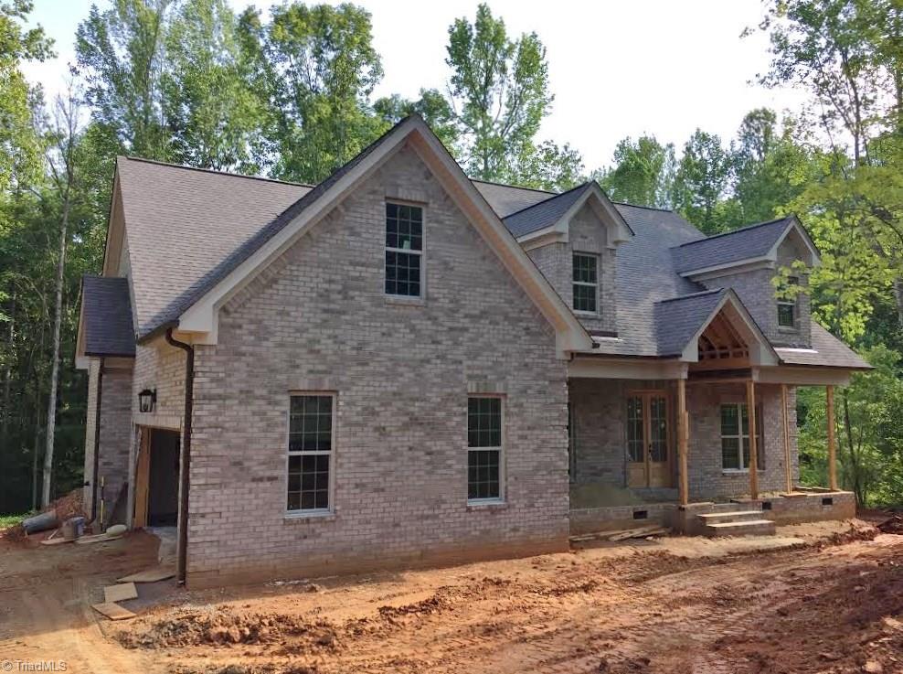 8439 Alice Player Drive Oak Ridge, NC 27310 - Photo 1 of 5