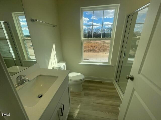 912 Channel Drop Loop Zebulon, NC 27597 - Photo 24 of 25 a bathroom with a sink and a mirror