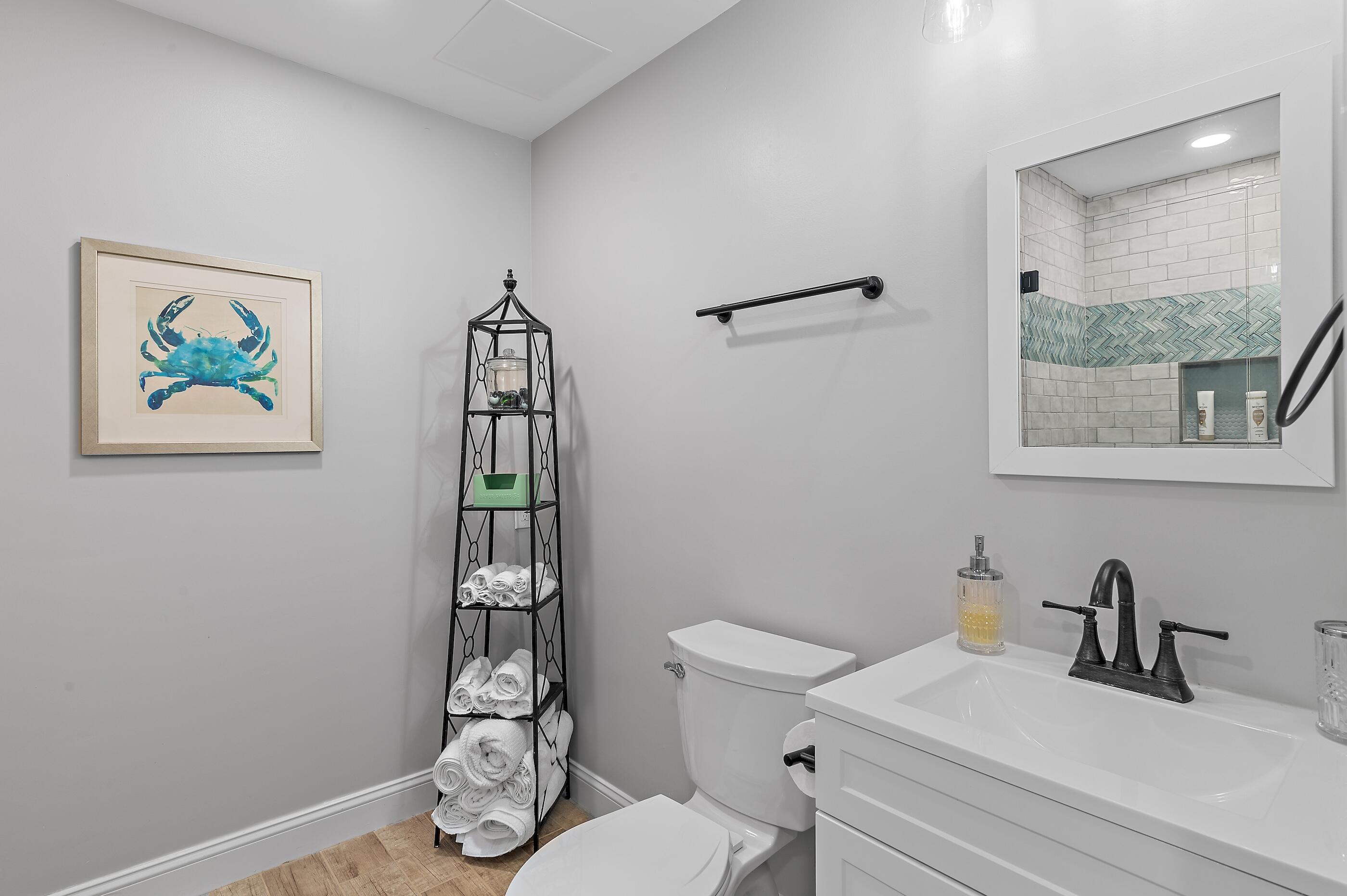 169 Durango Road Destin, FL 32541 - Photo 20 of 39 a bathroom with a toilet a sink and window