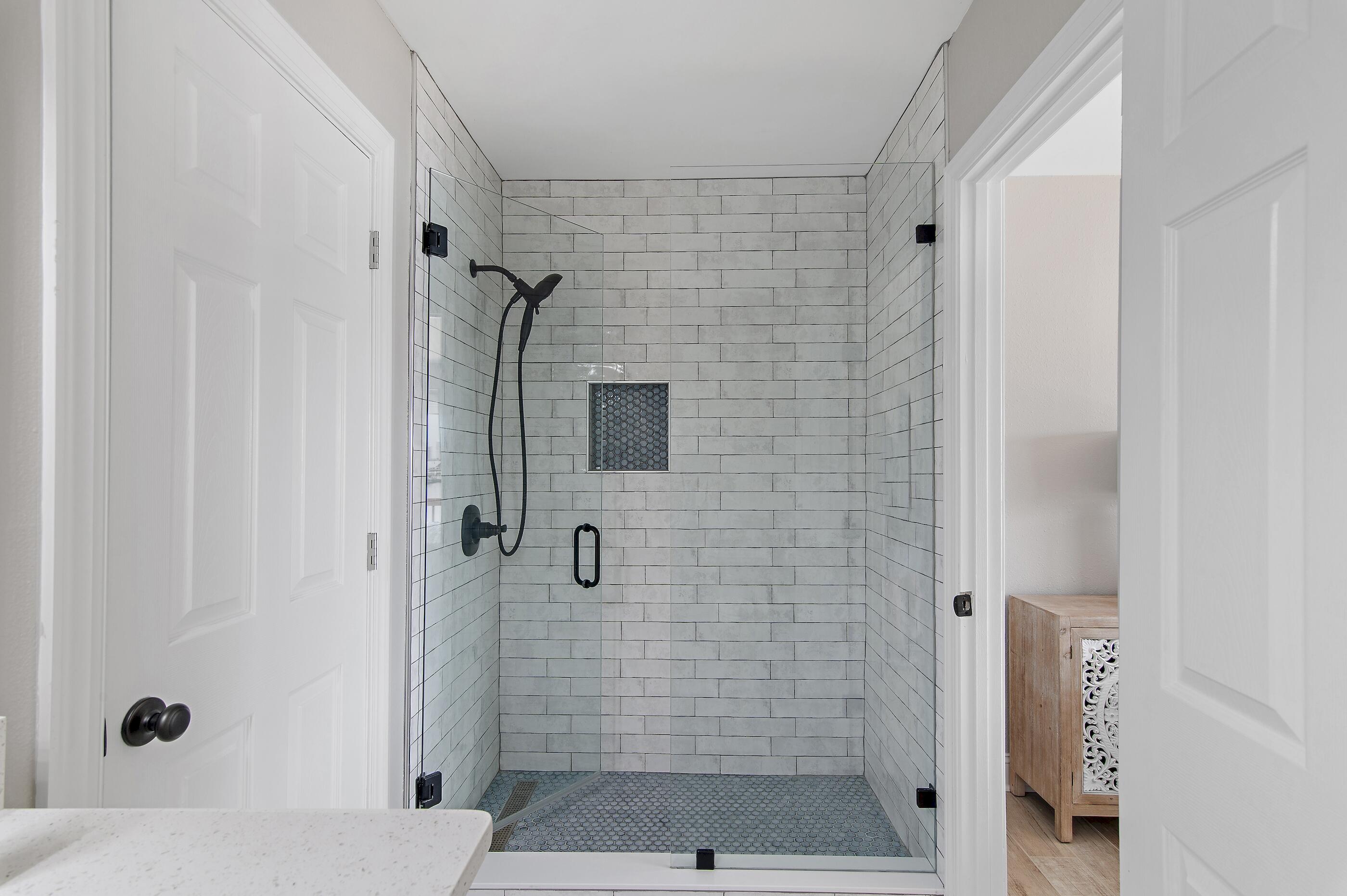 169 Durango Road Destin, FL 32541 - Photo 31 of 39 a bathroom with a shower