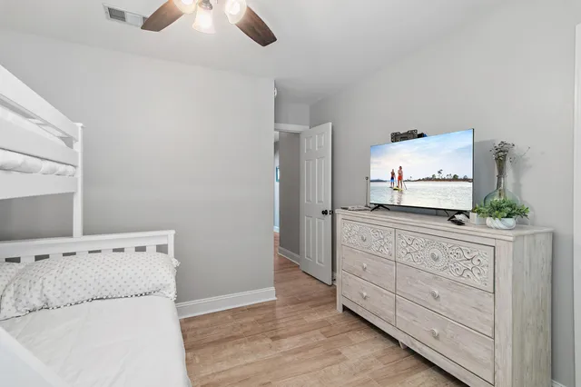 a room with a cabinets and flat screen tv
