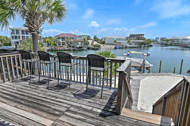 a view of a chairs on the roof deck
