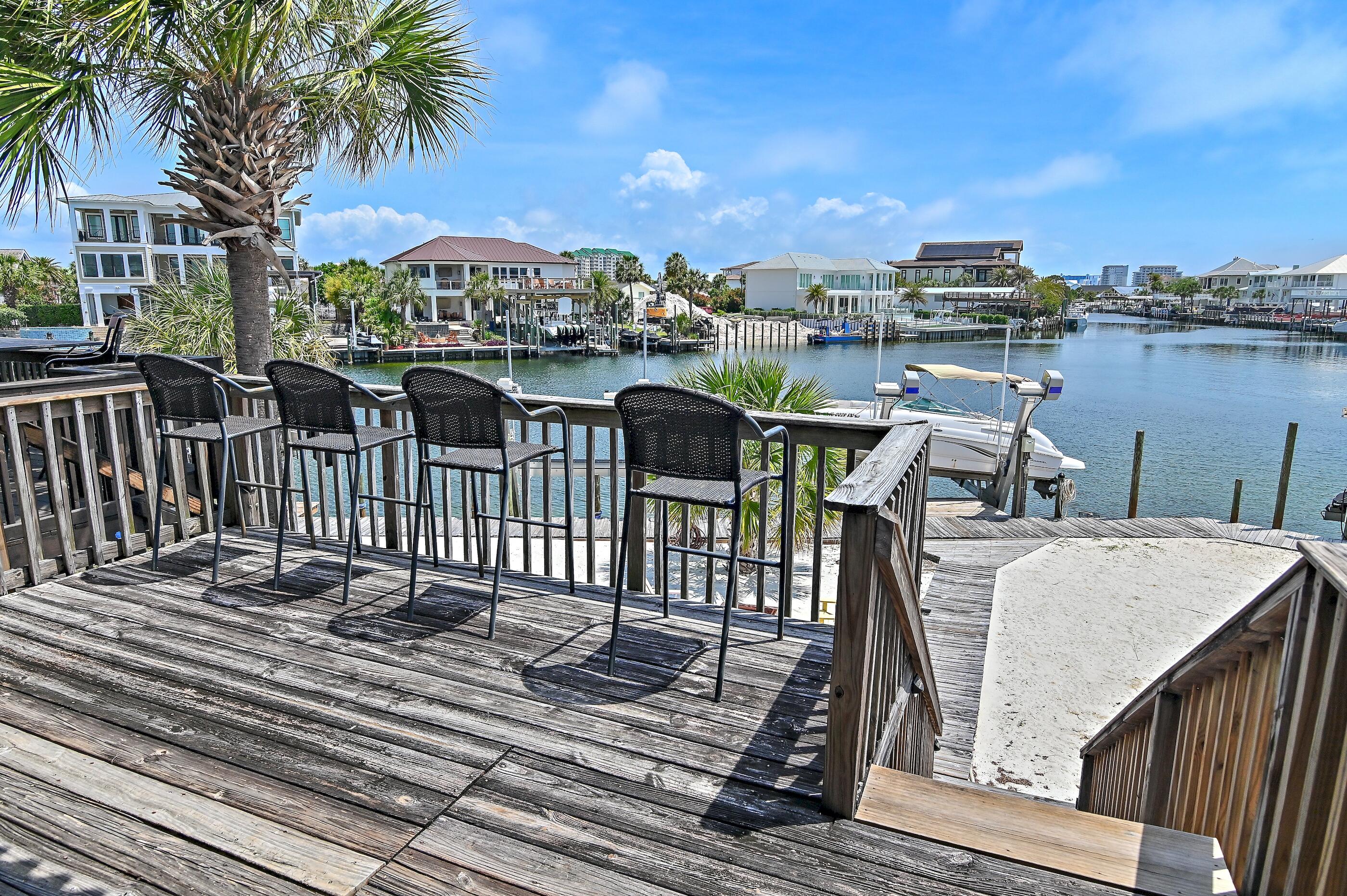 169 Durango Road Destin, FL 32541 - Photo 6 of 39 a view of a chairs on the roof deck