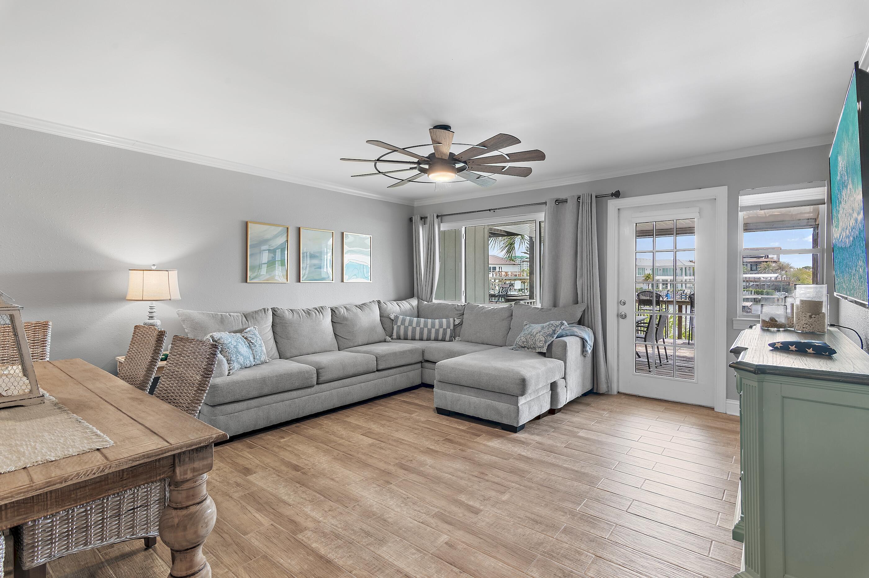 169 Durango Road Destin, FL 32541 - Photo 9 of 39 a living room with furniture and a large window