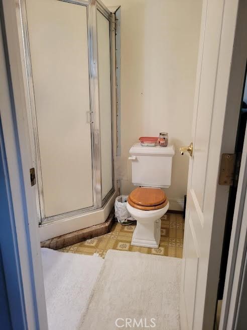 7136 Upper Palermo Road Palermo, CA 95968 - Photo 11 of 26 a bathroom with a toilet and a shower