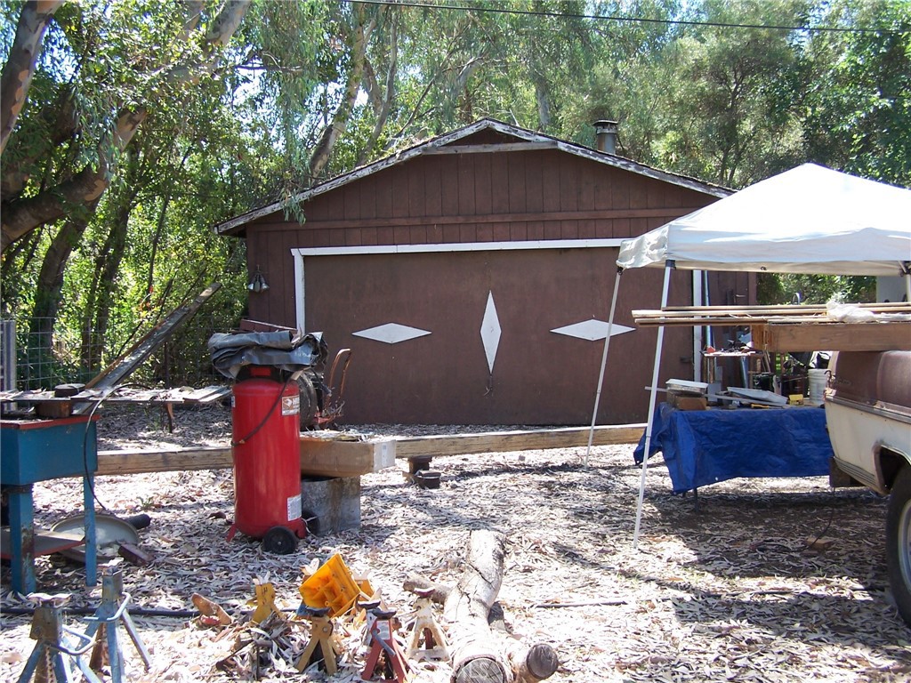 7136 Upper Palermo Road Palermo, CA 95968 - Photo 15 of 26 a couple of table and chairs under an umbrella