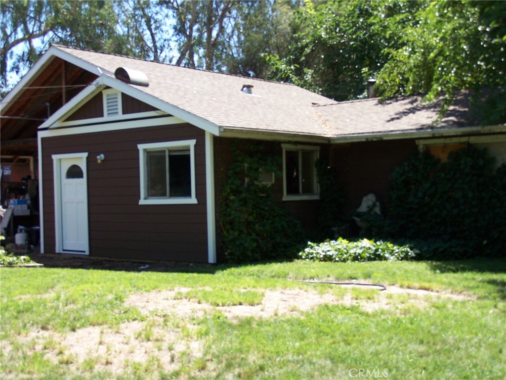 7136 Upper Palermo Road Palermo, CA 95968 - Photo 2 of 26 a front view of a house with a yard