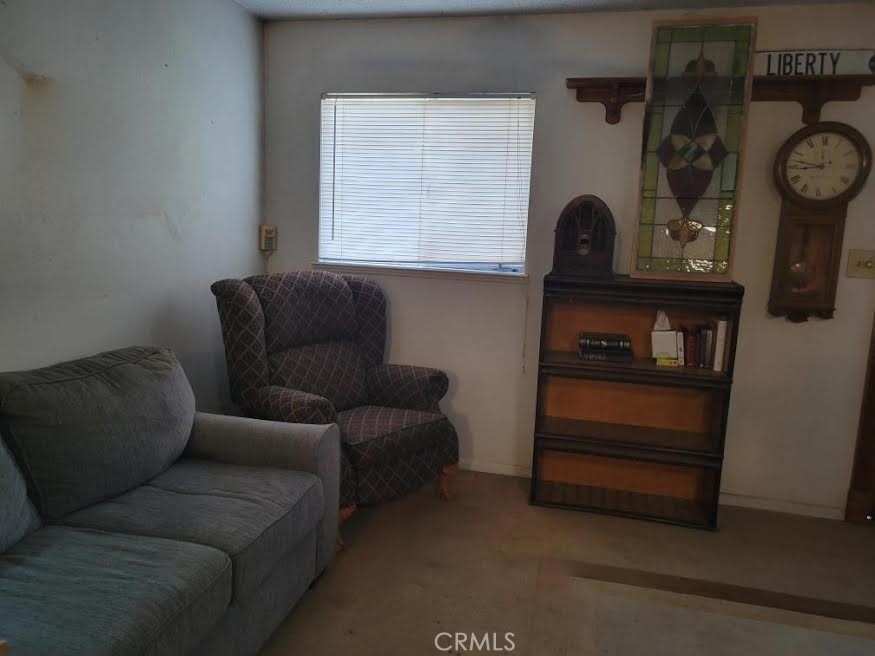 7136 Upper Palermo Road Palermo, CA 95968 - Photo 7 of 26 a living room with furniture and a window