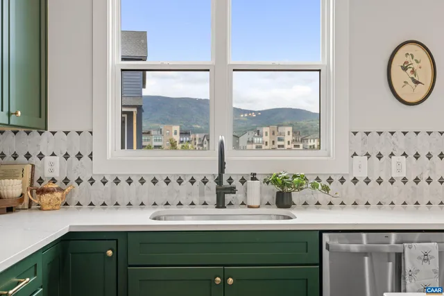 a bathroom with a sink and a large mirror