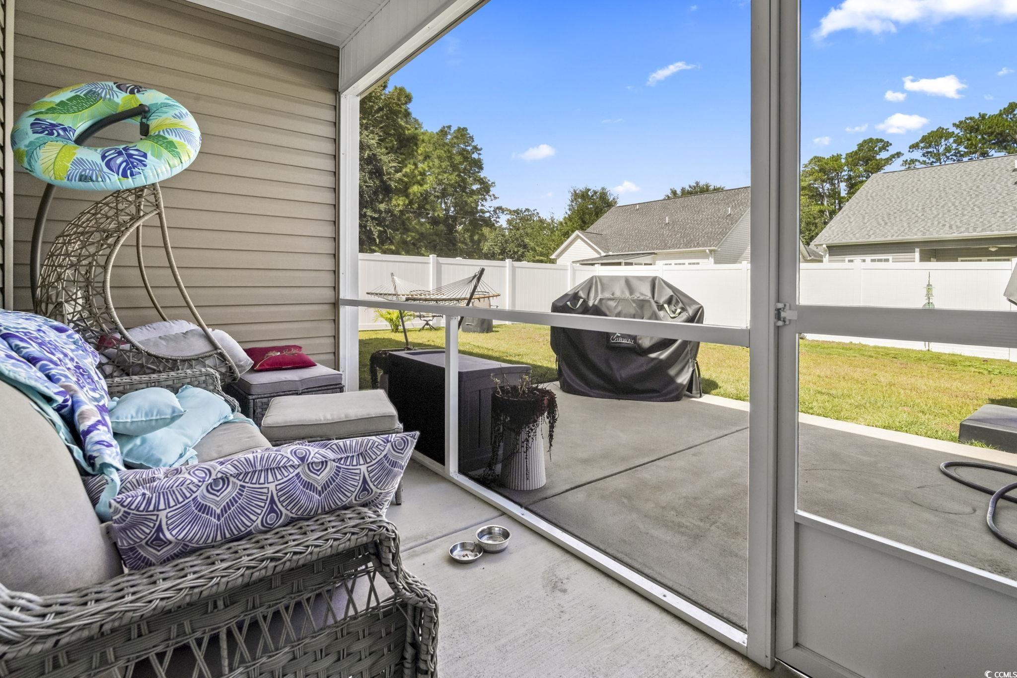 308 Concorde Drive Georgetown, SC 29440 - Photo 30 of 40 Screened Back Porch overlooking fenced backyard