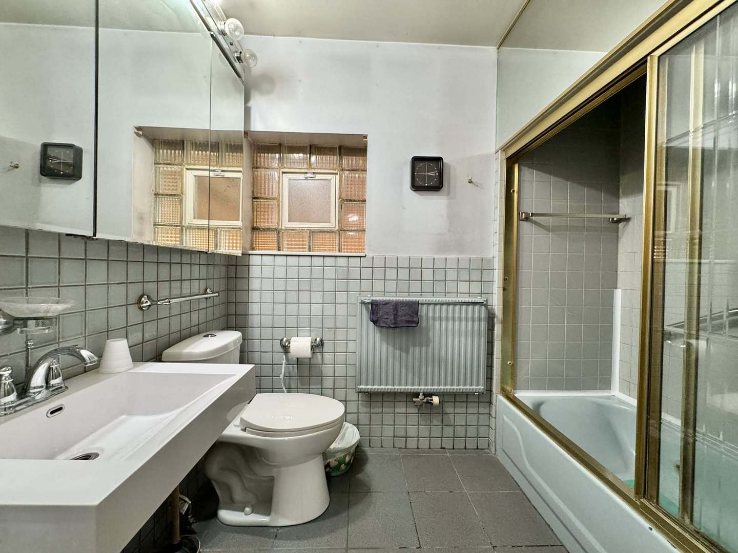 5437 North Linder Avenue Chicago, IL 60630 - Photo 12 of 28 a bathroom with a sink toilet and shower