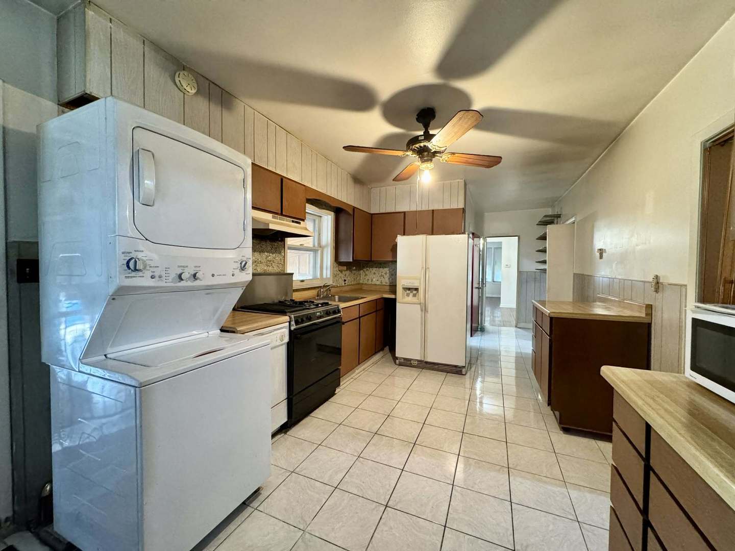 5437 North Linder Avenue Chicago, IL 60630 - Photo 14 of 28 a kitchen with a sink appliances and cabinets