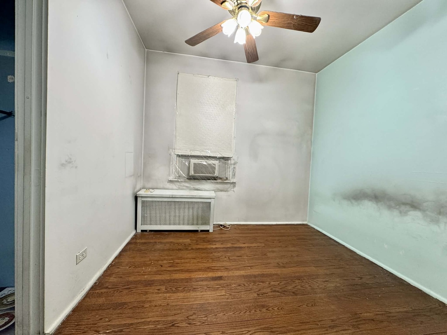 5437 North Linder Avenue Chicago, IL 60630 - Photo 10 of 28 a view of a room with wooden floor