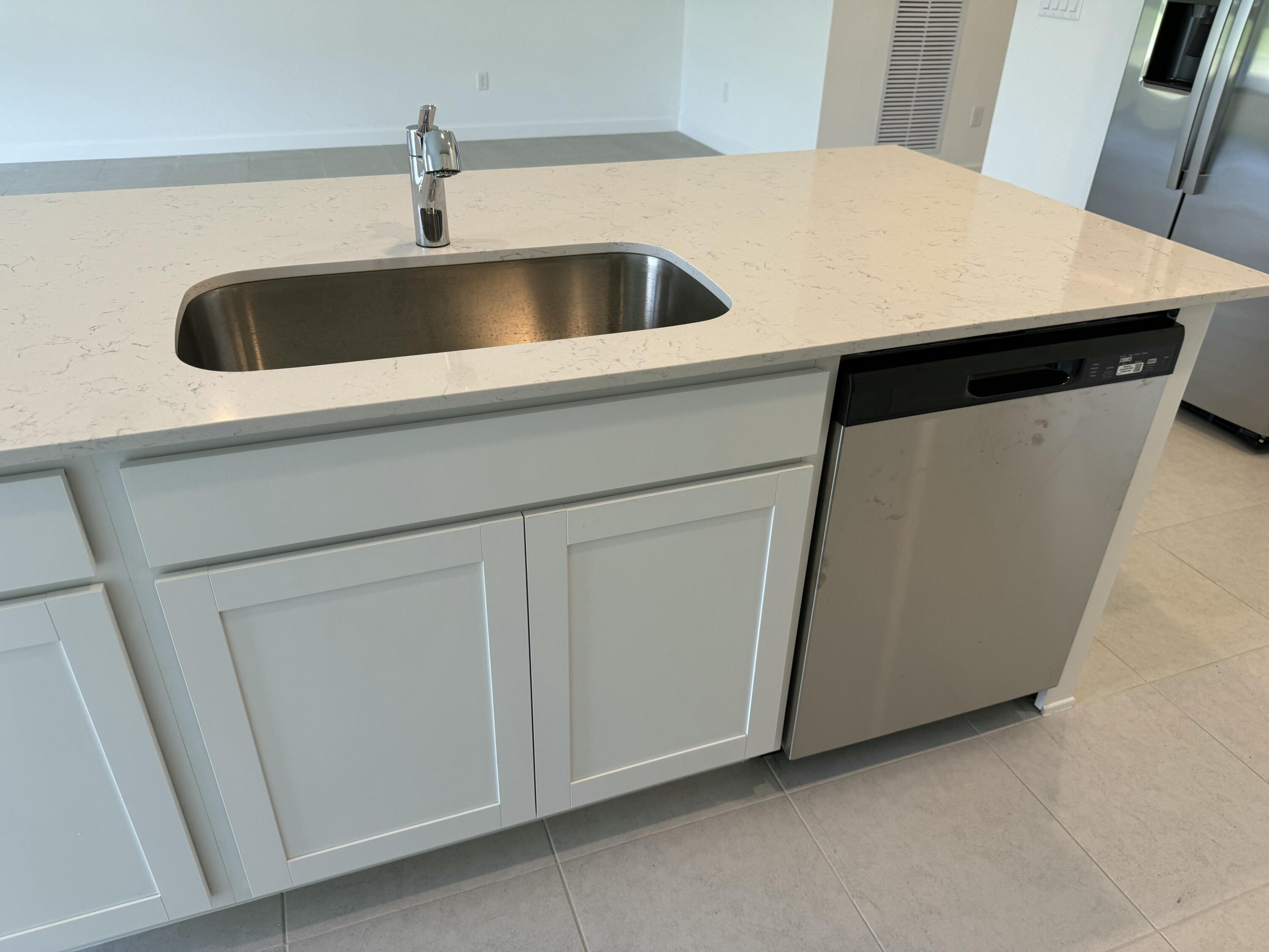 10445 Northwest Suncrest Loop Port Port St. Lucie, FL 34987 - Photo 20 of 45 a close view of utility room